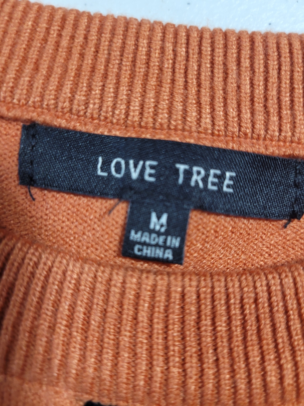 Love Tree Orange Argyle Crewneck Sweater with Black and Cream Diamonds - Picture 2 of 4
